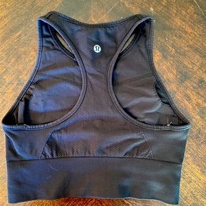 Black high neck LULULEMON sports bra